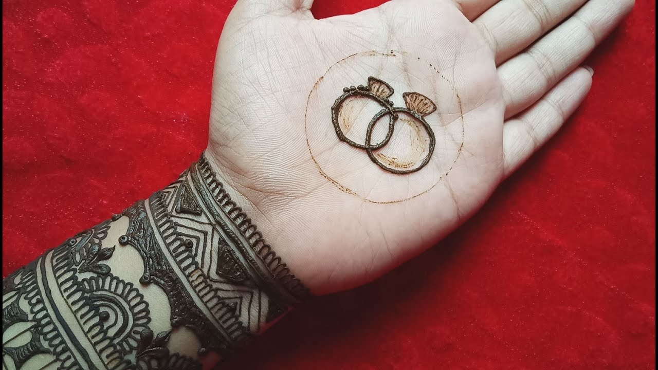 9 Unique Collections of Finger Mehndi Designs
